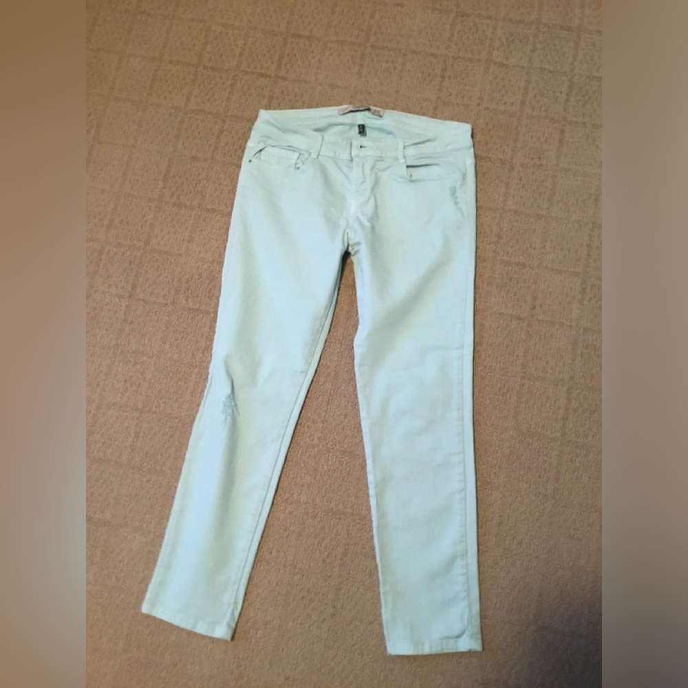 A pair of slim jeans teal color size 8US or 40 EUR purchased in Europe